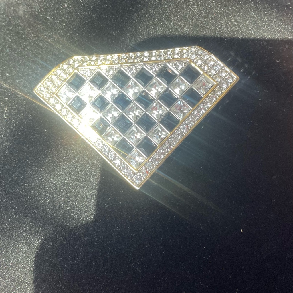 Elegant Silver And Gold Brooch With Diamond Accents
